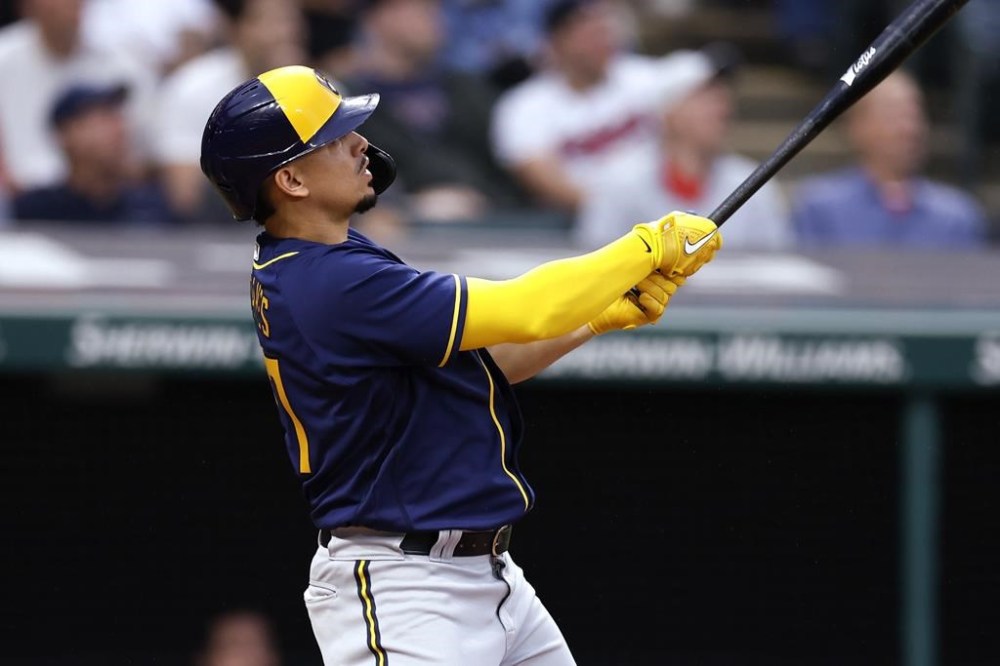 Milwaukee Brewers' Willy Adames watches his three-run home run off Cleveland Guardians starting pitcher Shane Bieber during the sixth inning of a baseball game Friday, June 23, 2023, in Cleveland. (AP Photo/Ron Schwane)