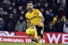 FILE - Wolverhampton Wanderers' Ruben Neves plays the ball during the English FA Cup third round replay soccer match between Wolverhampton Wanderers and Liverpool at Molineux stadium in Wolverhampton, England, Tuesday Jan. 17, 2023. Neves has become the latest high-profile player to move to Saudi Arabia after joining Al-Hilal for a transfer fee of £47 million pounds ($59.7 million). (AP Photo/Rui Vieira, File)