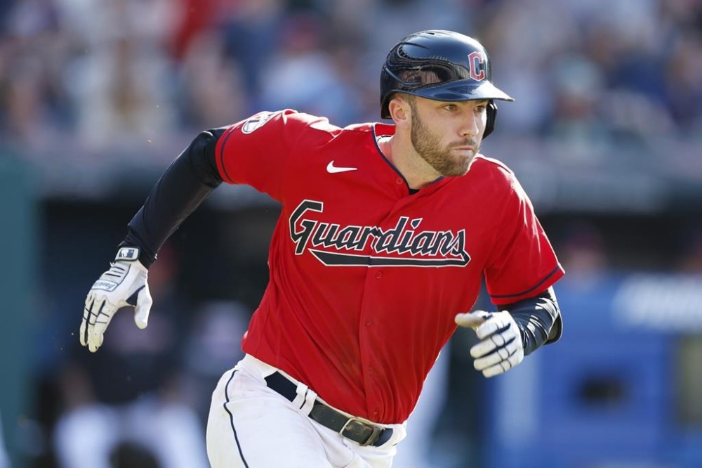 Cleveland Guardians' David Fry runs out his RBI single off Milwaukee Brewers relief pitcher Elvis Peguero during the sixth inning of a baseball game, Saturday, June 24, 2023, in Cleveland. (AP Photo/Ron Schwane)
