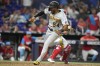 Pittsburgh Pirates' Josh Palacios (54) scores on a single hit by Ke'Bryan Hayes during the tenth inning of a baseball game against the Miami Marlins, Saturday, June 24, 2023, in Miami. (AP Photo/Lynne Sladky)