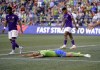 Seattle Sounders forward Héber (19) lies on the ground after his shot missed, while Orlando City forward Iván Angulo, left, walks away during the second half of an MLS soccer match, Saturday, June 24, 2023, in Seattle. (AP Photo/Lindsey Wasson)