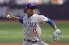 Chicago Cubs starting pitcher Marcus Stroman throws to a St. Louis Cardinals batter during the second inning of a baseball game Sunday, June 25, 2023, in London. (AP Photo/Kin Cheung)