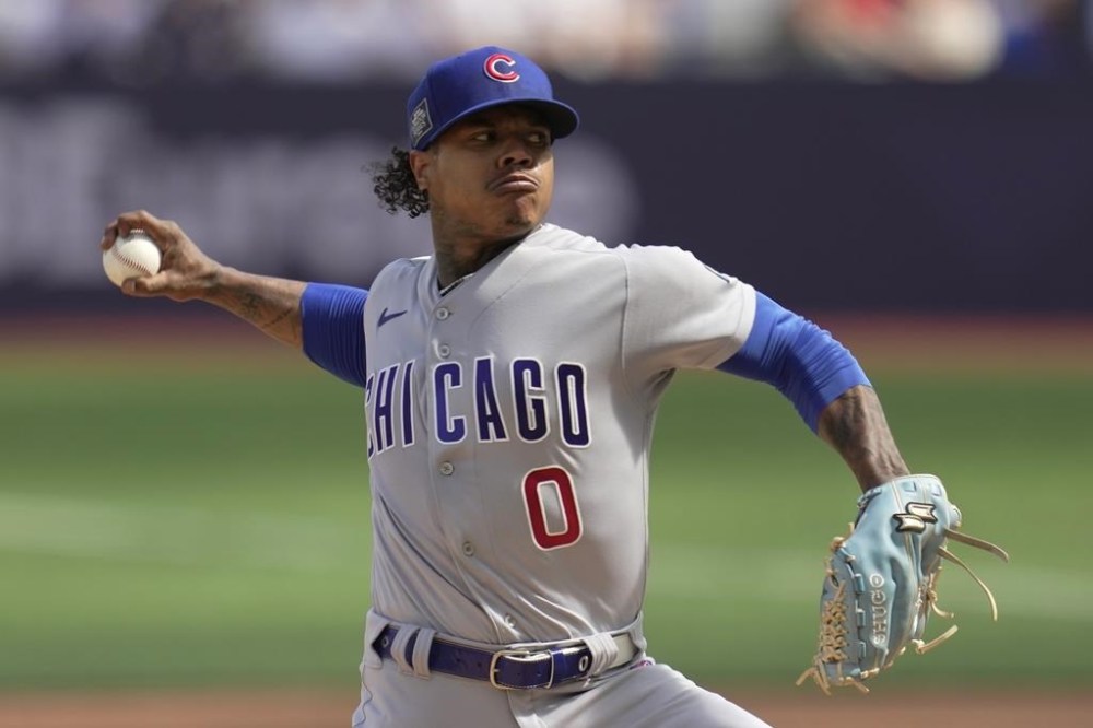 Chicago Cubs starting pitcher Marcus Stroman throws to a St. Louis Cardinals batter during the second inning of a baseball game Sunday, June 25, 2023, in London. (AP Photo/Kin Cheung)