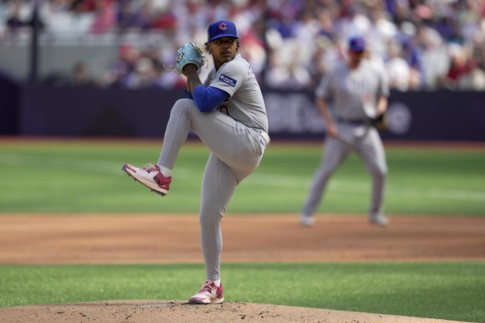 Chicago Cubs starting pitcher Marcus Stroman throws to a St. Louis Cardinals batter during the first inning of a baseball game Sunday, June 25, 2023, in London. (AP Photo/Kin Cheung)