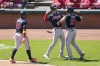 Atlanta Braves' Matt Olson, center, celebrates with Austin Riley (27) after hitting a three-run home run during the sixth inning of a baseball game against the Cincinnati Reds, Sunday, June 25, 2023, in Cincinnati. (AP Photo/Jeff Dean)