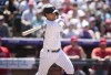 Colorado Rockies' Ezequiel Tovar follows the flight of his RBI-single against Los Angeles Angels relief pitcher Jose Soriano in the seventh inning of a baseball game, Sunday, June 25, 2023, in Denver. (AP Photo/David Zalubowski)