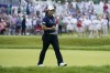 Ruoning Yin, of China, celebrates after making a birdie putt on the 18th hole during the final round of the Women's PGA Championship golf tournament, Sunday, June 25, 2023, in Springfield, N.J. (AP Photo/Seth Wenig)