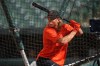 FILE - Jackson Holliday, the first overall draft pick by the Baltimore Orioles in the 2022 draft, takes batting practice with the team prior to a baseball game between the Orioles and the Tampa Bay Rays, July 27, 2022, in Baltimore. Baltimore infielder Jackson Holliday, the top pick in last year’s amateur draft and a son of former All-Star Matt Holliday, was among 14 first-round selections chosen for the All-Star Futures Game at Seattle on July 8, 2023. (AP Photo/Julio Cortez, File)