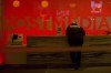 A security guard stands by the front reception desk at Postmedia's Toronto headquarters on March 12, 2018. THE CANADIAN PRESS/Chris Young