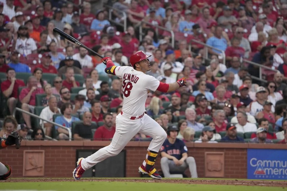 St. Louis Cardinals' Nolan Arenado follows through on an RBI double during the fifth inning of a baseball game against the Houston Astros Tuesday, June 27, 2023, in St. Louis. (AP Photo/Jeff Roberson)