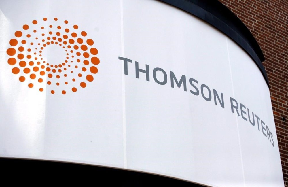 Thomson Reuters Corp. has signed a deal to buy Imagen Ltd., a company that helps sports organizations, businesses and media companies manage their digital content libraries on the cloud. A Thomson Reuters office sign is shown in Boston, Thursday August 6, 2009. THE CANADIAN PRESS/AP-Eric J. Shelton