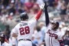 Atlanta Braves' Travis d'Arnaud (16) celebrates with Matt Olson (28) after Olson hit a solo home run in the eight inning of a baseball game against the Minnesota Twins, Wednesday, June 28, 2023, in Atlanta. (AP Photo/Brynn Anderson)