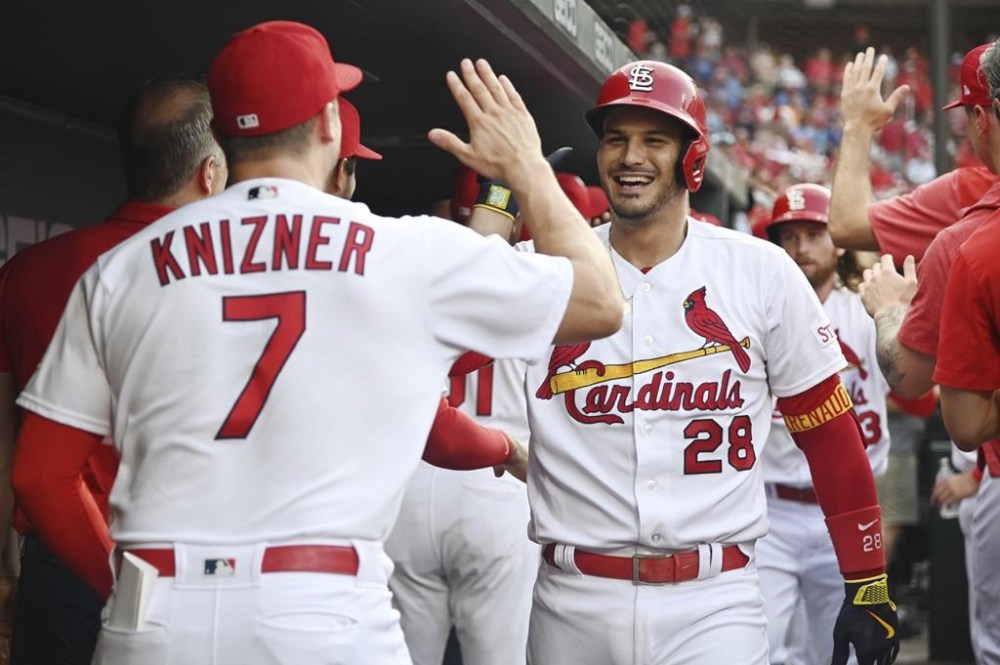 St. Louis Cardinals third baseman Nolan Arenado (28) celebrates after hitting a three run home run in the first inning against the Houston Astros during a baseball game Wednesday, June 28, 2023, in St. Louis. (AP Photo/Michael Thomas)