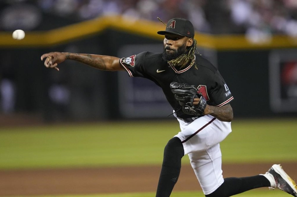 Arizona Diamondbacks relief pitcher Miguel Castro throws against the Tampa Bay Rays during the eighth inning of a baseball game, Wednesday, June 28, 2023, in Phoenix. (AP Photo/Matt York)