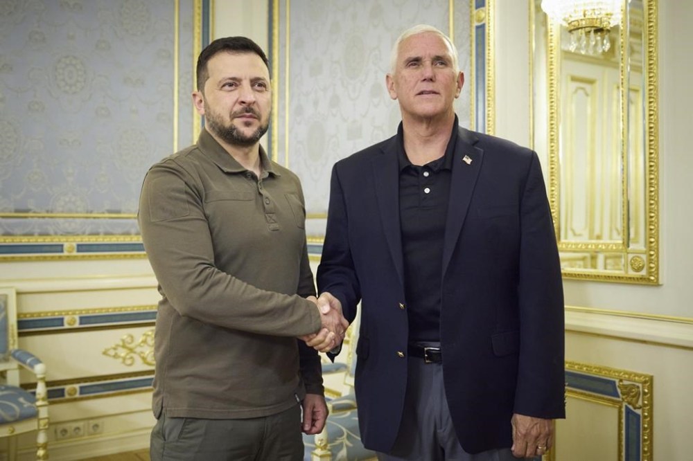 In this photo provided by the Ukrainian Presidential Press Office, Ukrainian President Volodymyr Zelenskyy, left, and former US Vice President Mike Pence pose for photo during their meeting in Kyiv, Ukraine, Thursday, June 29, 2023. (Ukrainian Presidential Press Office via AP)