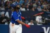 Toronto Blue Jays first baseman Vladimir Guerrero Jr. (27) watches his two-run home run, scoring teammate Brandon Belt against the Oakland Athletics batter in sixth inning American League baseball action in Toronto, Saturday, June 24, 2023. Guerrero Jr. will compete in the T-Mobile Home Run Derby during the All-Star festivities in Seattle on July 10. THE CANADIAN PRESS/Jon Blacker