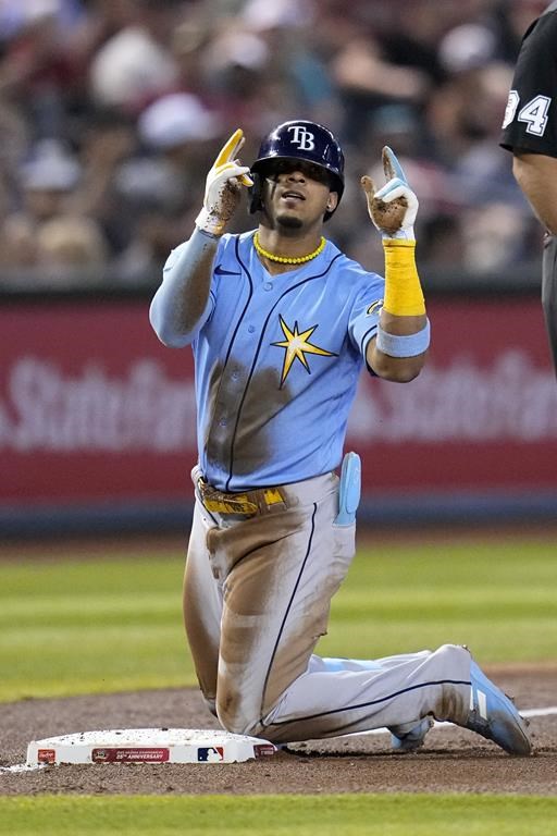 Tampa Bay Rays' Wander Franco celebrates after his two-run triple against the Arizona Diamondbacks during the third inning of a baseball game Thursday, June 29, 2023, in Phoenix. (AP Photo/Ross D. Franklin)