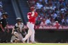 Los Angeles Angels designated hitter Shohei Ohtani (17) hits a home run during the ninth inning of a baseball game against the Chicago White Sox in Anaheim, Calif., Thursday, June 29, 2023. Mike Trout also scored. (AP Photo/Ashley Landis)