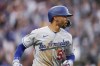 Los Angeles Dodgers' Mookie Betts runs the bases on a three-run home run against the Colorado Rockies during the fourth inning of a baseball game Wednesday, June 28, 2023, in Denver. (AP Photo/David Zalubowski)