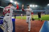 Boston Red Sox starting pitcher James Paxton (65) is congratulated by third base coach Kyle Hudson (84) as he exits the game during eighth inning American League MLB baseball action against the Toronto Blue Jays in Toronto, on Friday, June 30, 2023.THE CANADIAN PRESS/Chris Young