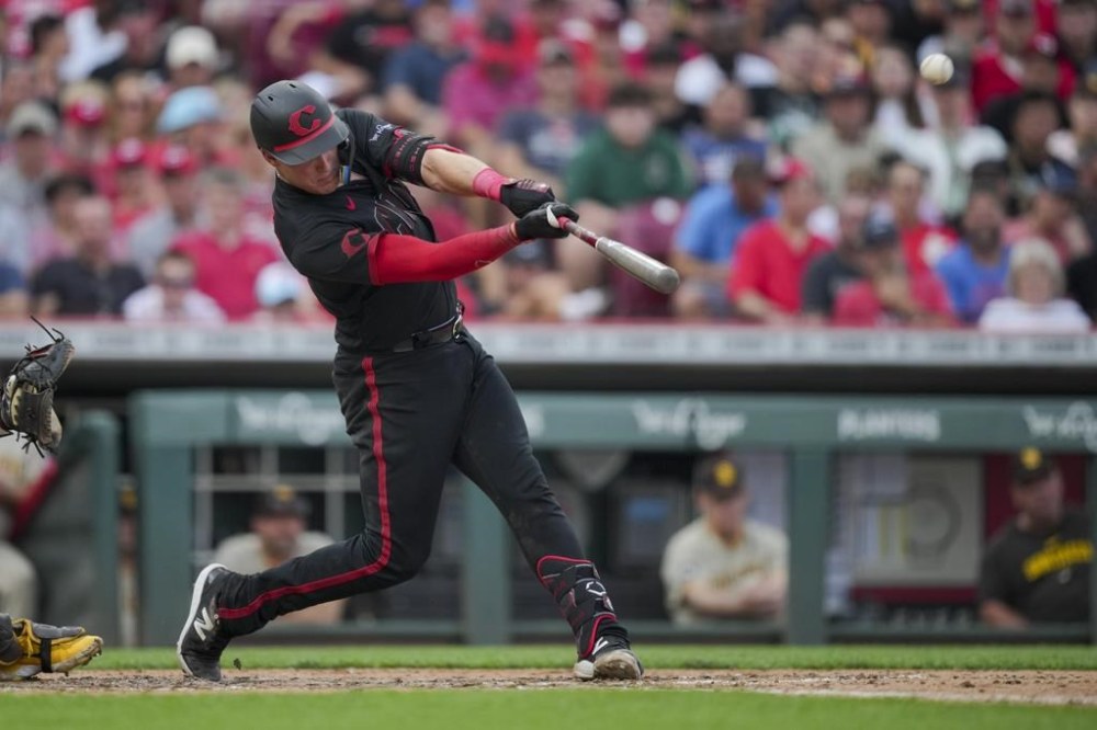Cincinnati Reds' Tyler Stephenson hits a solo home run during the seventh inning of a baseball game against the San Diego Padres in Cincinnati, Friday, June 30, 2023. (AP Photo/Aaron Doster)