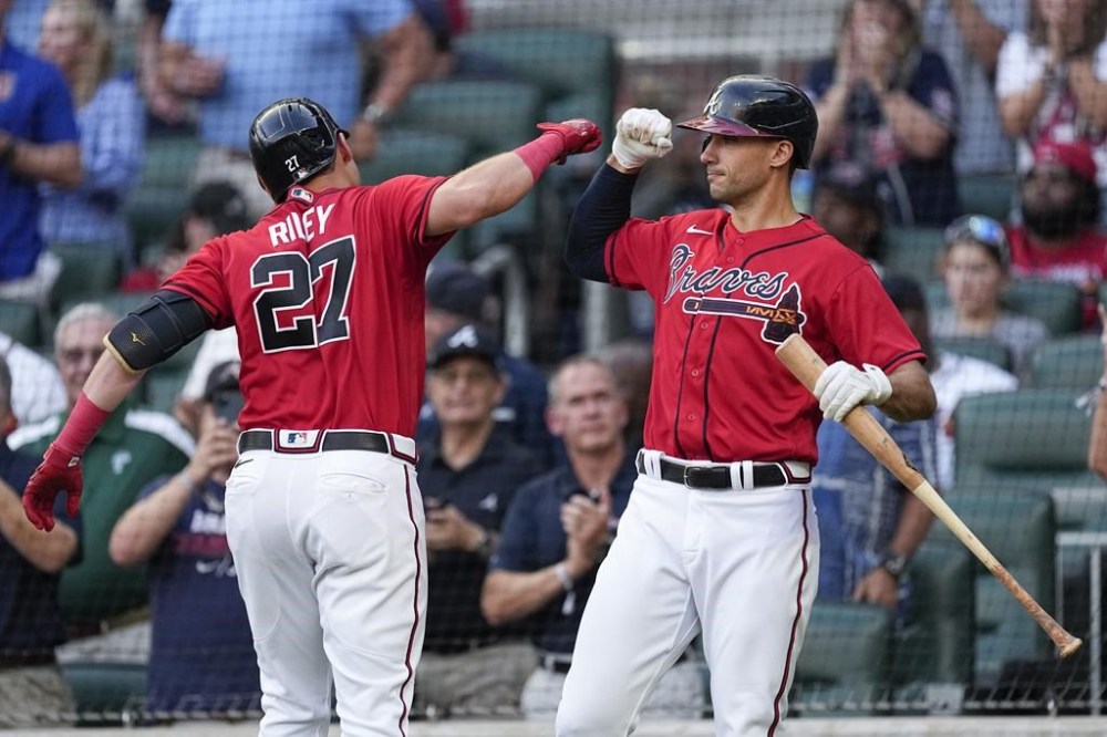 Braves score 4 in 11th, top Rockies 6-2, spoil uniform debut - The