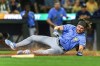 Tampa Bay Rays' Josh Lowe scores against the Seattle Mariners during the eighth inning of a baseball game, Friday, June 30, 2023, in Seattle. (AP Photo/Caean Couto)