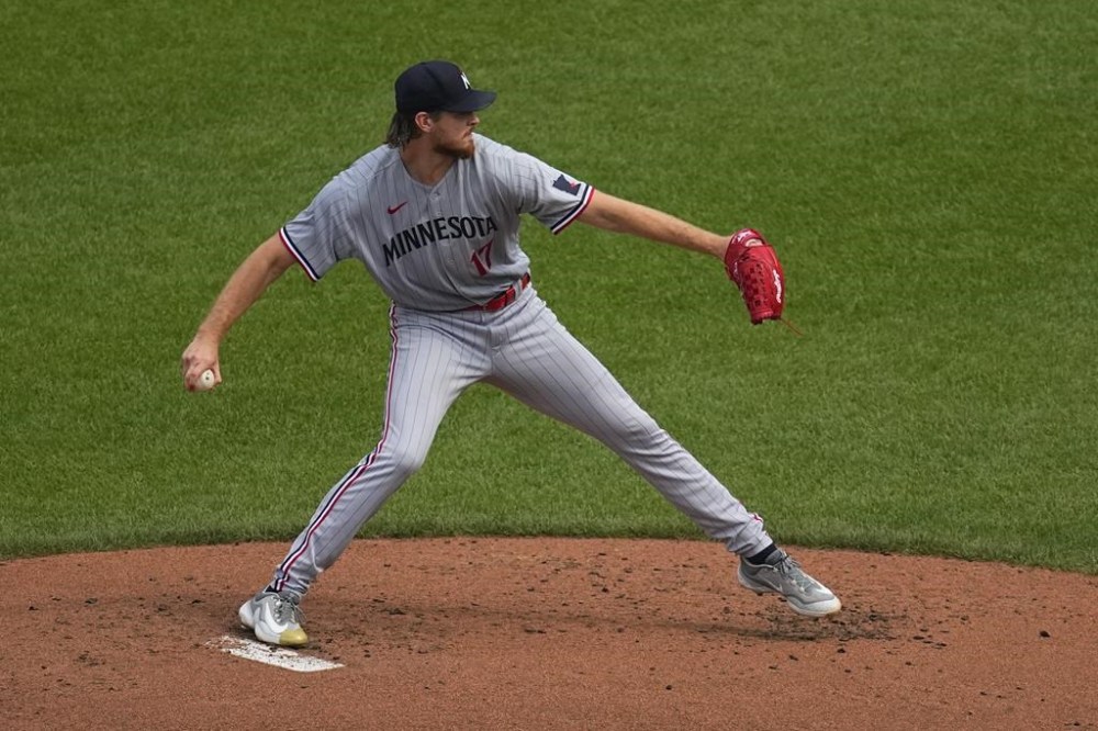 Minnesota Twins starting pitcher Bailey Ober throws a pitch to the Baltimore Orioles during the second inning of a baseball game, Saturday, July 1, 2023, in Baltimore. (AP Photo/Julio Cortez)
