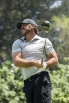 Brooks Koepka watches his shot from the 16th tee during the second round of LIV Golf-Valderrama golf tournament Saturday, July 1, 2023, in Sotogrande, Spain. (Charles Laberge/LIV Golf via AP)