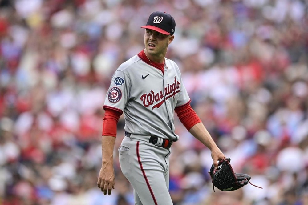Washington Nationals starting pitcher MacKenzie Gore walks off the field after he was removed during the third inning of a baseball game against the Philadelphia Phillies, Saturday, July 1, 2023, in Philadelphia. (AP Photo/Derik Hamilton)