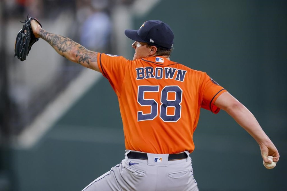 Houston Astros pitcher Hunter Brown delivers a pitch in the second inning of a baseball game against the Texas Rangers, Saturday, July 1, 2023, in Arlington, Texas. (AP Photo/Gareth Patterson)