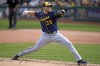 Milwaukee Brewers starting pitcher Corbin Burnes delivers during the second inning of a baseball game against the Pittsburgh Pirates in Pittsburgh, Saturday, July 1, 2023. (AP Photo/Gene J. Puskar)