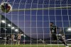 Minnesota United midfielder Emanuel Reynoso, right, scores against the Portland Timbers during the second half of an MLS soccer match Saturday, July 1, 2023, in St. Paul, Minn. (AP Photo/Abbie Parr)