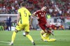 Hungary's Dominik Szoboszlai, is fouled by Lithuania's Dominik Szoboszlai, right, during the Euro 2024 group G qualifying soccer match between Hungary and Lithuania in Budapest, Hungary, Tuesday, June 20, 2023. (Robert Hegedus/MTI via AP)