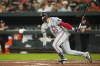 Minnesota Twins' Royce Lewis watches his single against the Baltimore Orioles during the fourth inning of a baseball game, Friday, June 30, 2023, in Baltimore. (AP Photo/Julio Cortez)