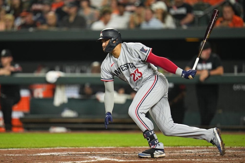 Minnesota Twins' Royce Lewis watches his single against the Baltimore Orioles during the fourth inning of a baseball game, Friday, June 30, 2023, in Baltimore. (AP Photo/Julio Cortez)