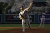 Los Angeles Dodgers starting pitcher Clayton Kershaw (22) throws during the first inning of a baseball game against the Los Angeles Angels in Anaheim, Calif., Tuesday, June 20, 2023. (AP Photo/Ashley Landis)