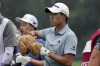 Collin Morikawa prepares to drive off the second tee during the final round of the Rocket Mortgage Classic golf tournament at Detroit Country Club, Sunday, July 2, 2023, in Detroit. (AP Photo/Carlos Osorio)
