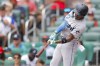 Miami Marlins' Jazz Chisholm Jr. hits a single during the first inning of a baseball game against the Atlanta Braves, Sunday, July 2, 2023, in Atlanta. (AP Photo/Alex Slitz)