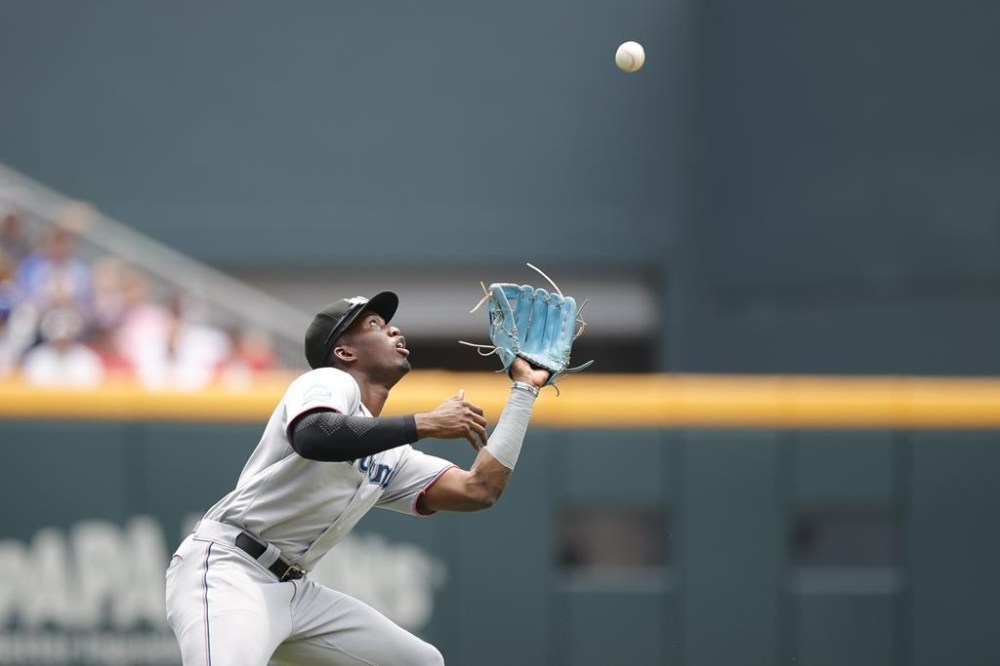 Miami Marlins right fielder Jesus Sanchez catches a fly ball hit by Atlanta Braves' Ozzie Albies during the first inning of a baseball game Sunday, July 2, 2023, in Atlanta. (AP Photo/Alex Slitz)