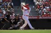 Los Angeles Angels' Shohei Ohtani, right, hits a solo home run as Arizona Diamondbacks catcher Gabriel Moreno, center, and home plate umpire Doug Eddings watch during the eighth inning of a baseball game Sunday, July 2, 2023, in Anaheim, Calif. (AP Photo/Mark J. Terrill)