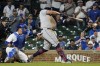 Cleveland Guardians' Josh Naylor hits a two-run single against the Chicago Cubs during the 10th inning of a baseball game, Sunday, July 2, 2023, in Chicago. (AP Photo/David Banks)