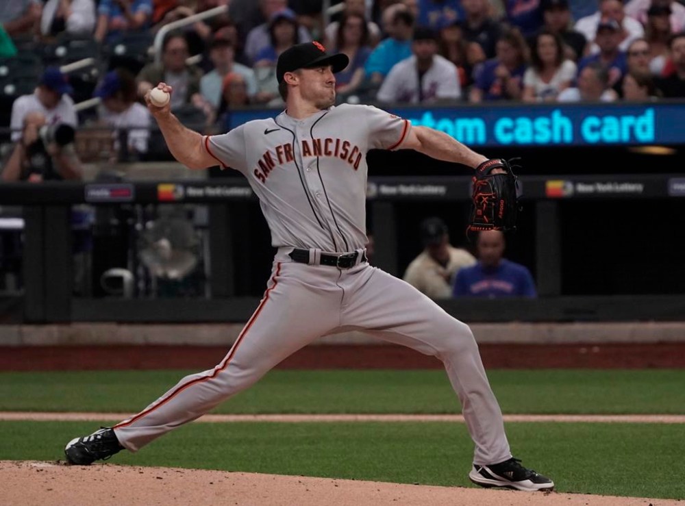 San Francisco Giants' David Peterson pitches during the first inning of a baseball game against the New York Mets, Sunday, July 2, 2023, in New York. (AP Photo/Bebeto Matthews)