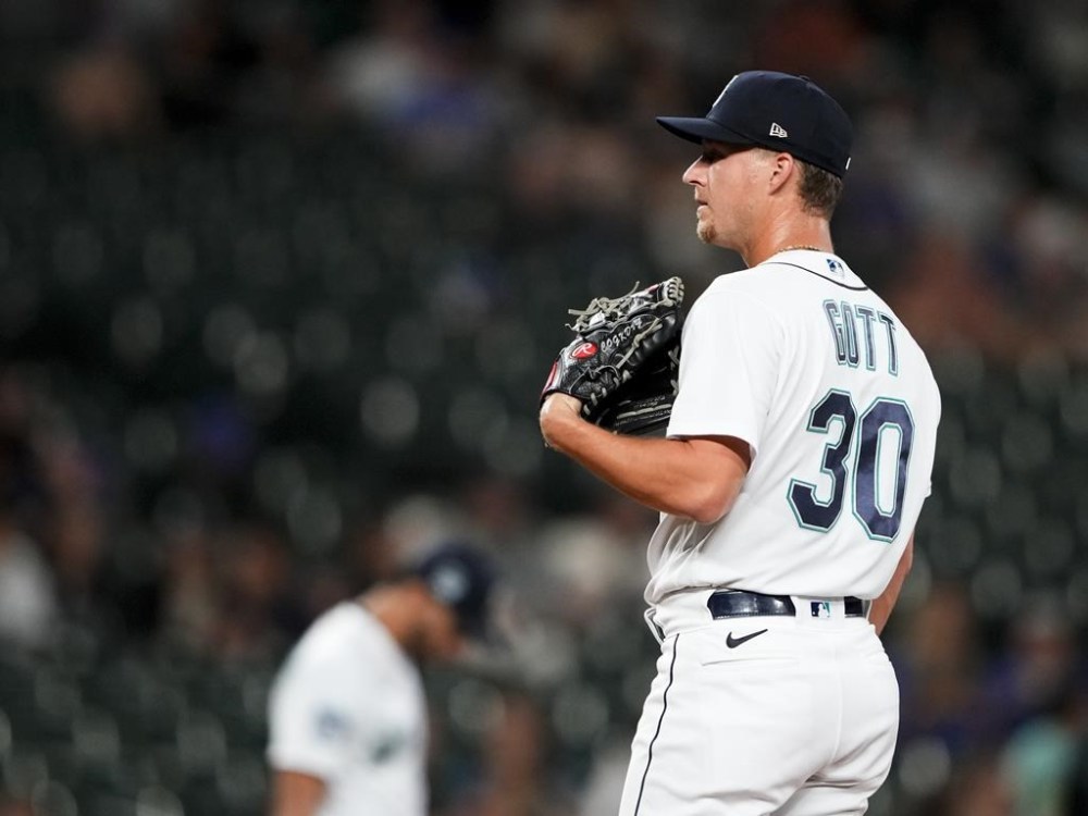 Seattle Mariners relief pitcher Trevor Gott pauses after allowing a two-run double to Washington Nationals