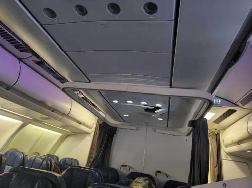 This photo provided by Tara Goodall shows a crack in the ceiling of a Hawaiian Airlines plane that encountered severe turbulence during a flight from Honolulu to Sydney, June 30, 2023. The airline says airport medics assessed and released three injured passengers when the flight landed in Sydney. One passenger and three flight attendants were 