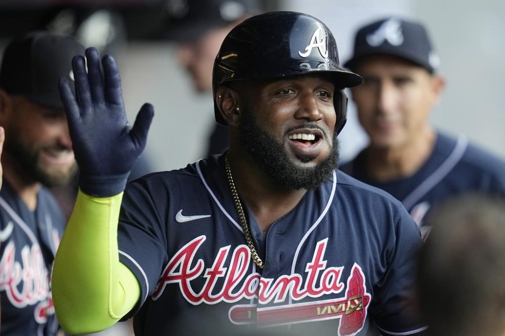CORRECTS TO HOME RUN NOT SECOND HOME RUN - Atlanta Braves' Marcell Ozuna celebrates after his home run in the fourth inning of a baseball game against the Cleveland Guardians, Monday, July 3, 2023, in Cleveland. (AP Photo/Sue Ogrocki)