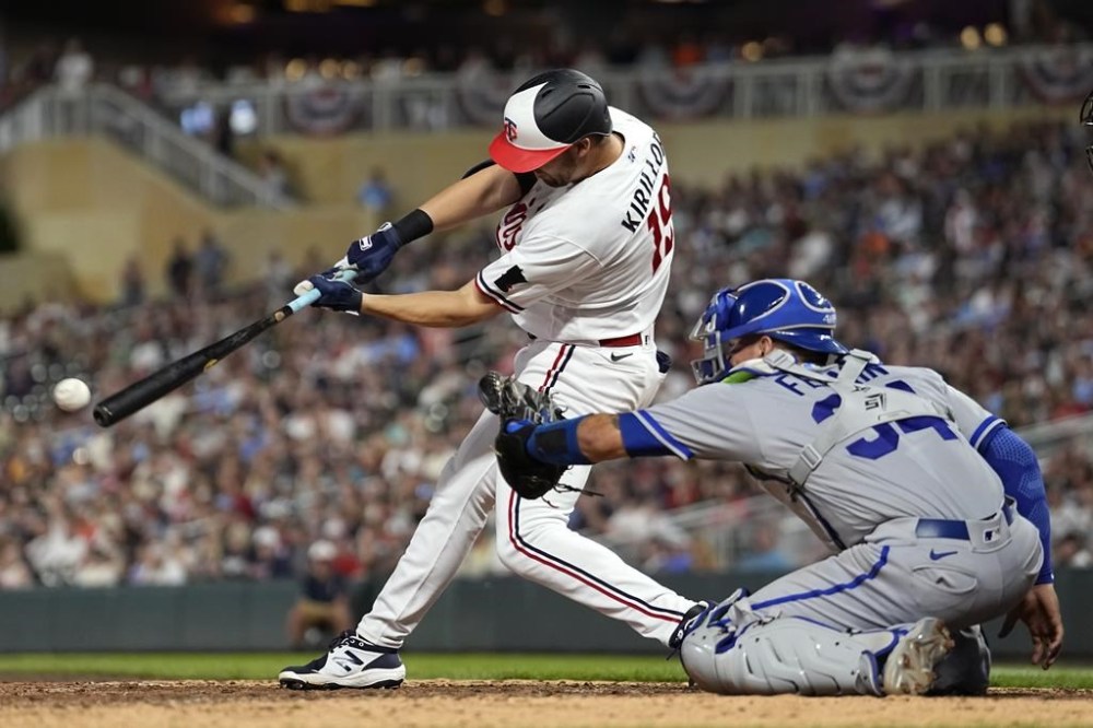 Minnesota Twins' Alex Kirilloff hits an RBI single during the eighth inning of a baseball game against the Kansas City Royals, Monday, July 3, 2023, in Minneapolis. (AP Photo/Abbie Parr)