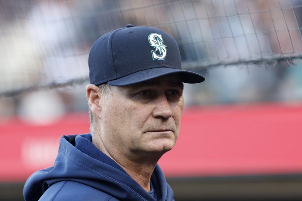 Seattle Mariners manager Scott Servais stands in the dugout before a baseball game against the San Francisco Giants in San Francisco, Monday, July 3, 2023. (AP Photo/Josie Lepe)