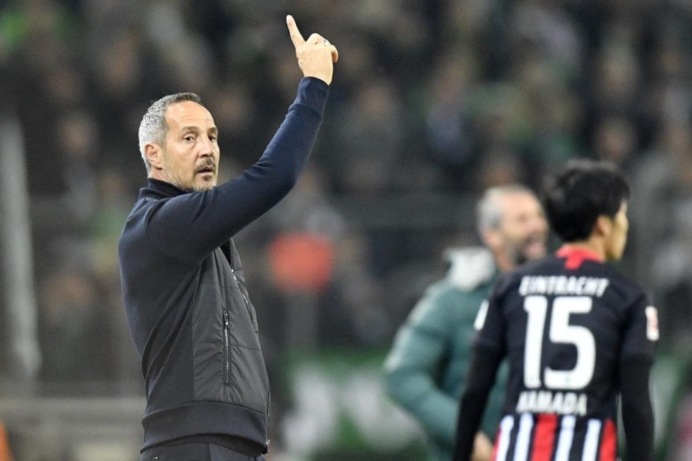 FILE - Then Frankfurt's manager Adi Hutter gestures during the German Bundesliga soccer match between Borussia Moenchenglabach and Eintracht Frankfurt in Moenchengladbach, Germany, Sunday Oct. 27, 2019. French club Monaco has hired Adi Hütter as its new coach on a two-year contract. Hütter replaces Belgian coach Philippe Clement, who was fired last month after the club finished a disappointing sixth in the French league last season. (AP Photo/Martin Meissner, File)