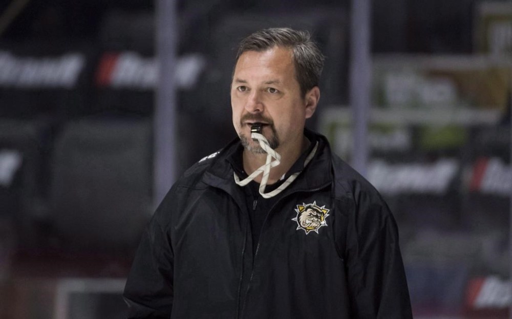 Hamilton Bulldogs head coach John Gruden watches his team practice at the Memorial Cup in Regina, Sask., Thursday, May 24, 2018. Gruden is the new head coach of the Toronto Marlies. He succeeds Greg Moore in the position.THE CANADIAN PRESS/Jonathan Hayward